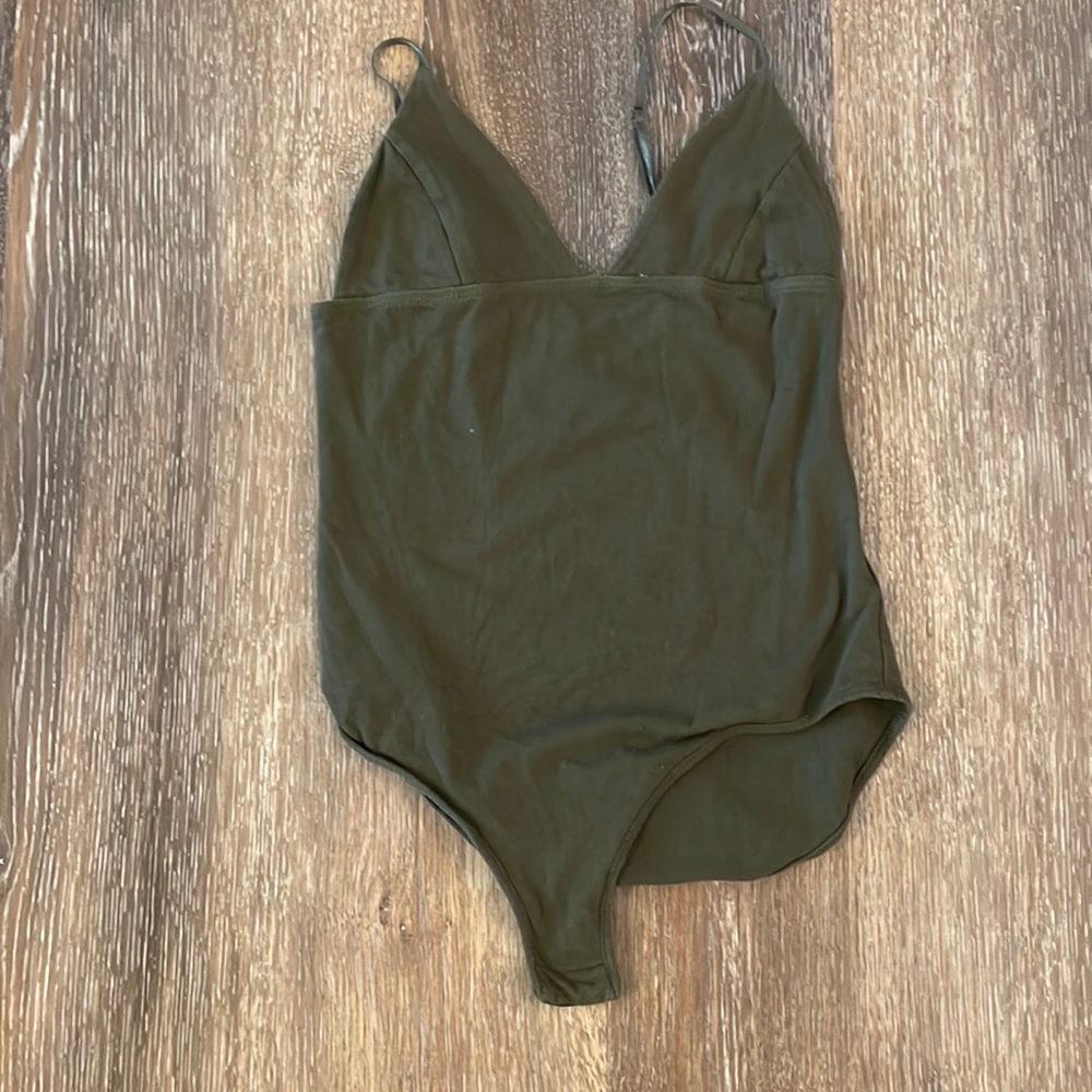 Green body suit.